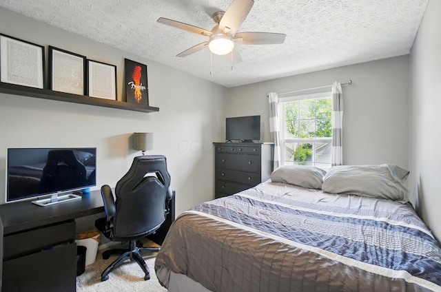 7221 Dewfall Dr, Reynoldsburg, OH 43068 - bedroom with a textured ceiling, carpet floors, an office area, and a ceiling fan