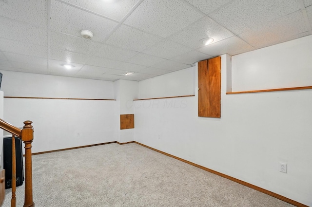 7221 Dewfall Dr, Reynoldsburg, OH 43068 - finished below grade area with carpet floors, a drop ceiling, baseboards, and stairs