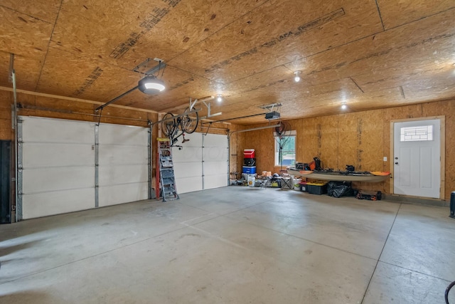 1267 N Dundee Trl, Bucyrus, OH 44820 - garage featuring a garage door opener