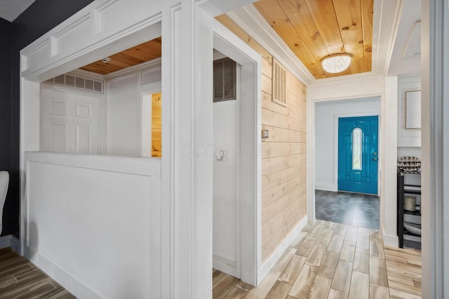 1267 N Dundee Trl, Bucyrus, OH 44820 - hall with wood finished floors, wooden ceiling, wooden walls, and baseboards