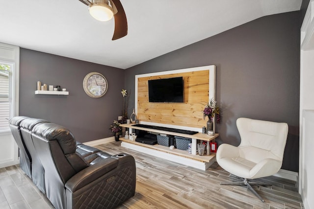 1267 N Dundee Trl, Bucyrus, OH 44820 - living area featuring lofted ceiling, light wood finished floors, baseboards, and ceiling fan