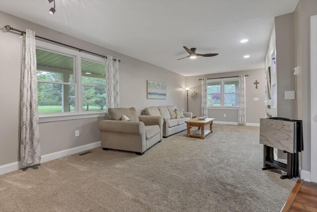 8270 Windy Hollow Rd, Johnstown, OH 43031 - carpeted living area featuring a ceiling fan, baseboards, and recessed lighting