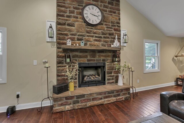 8270 Windy Hollow Rd, Johnstown, OH 43031 - living area with baseboards, wood finished floors, a fireplace, and high vaulted ceiling