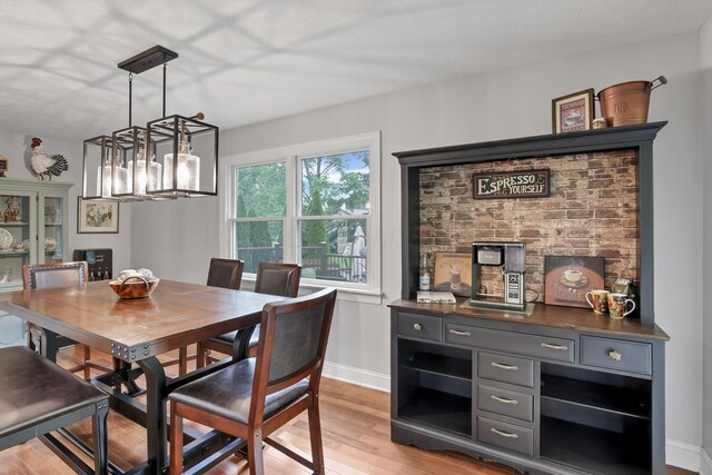 8270 Windy Hollow Rd, Johnstown, OH 43031 - dining area with light wood-style floors and baseboards