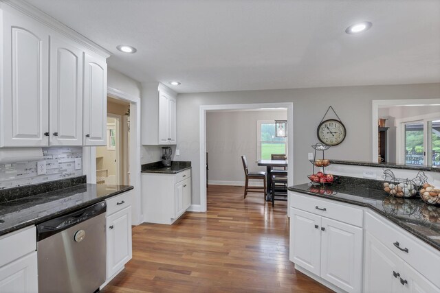 8270 Windy Hollow Rd, Johnstown, OH 43031 - kitchen with stainless steel dishwasher, wood finished floors, white cabinets, tasteful backsplash, and recessed lighting
