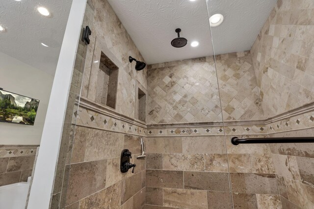 8270 Windy Hollow Rd, Johnstown, OH 43031 - bathroom view of a tile shower and recessed lighting