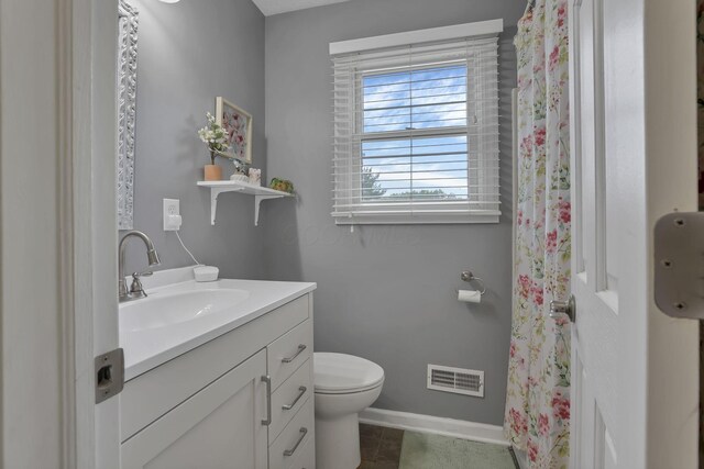 8270 Windy Hollow Rd, Johnstown, OH 43031 - bathroom with vanity, toilet, baseboards, tile patterned flooring, and a shower with curtain