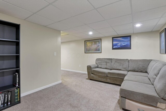 8270 Windy Hollow Rd, Johnstown, OH 43031 - carpeted living room featuring a paneled ceiling, baseboards, and recessed lighting