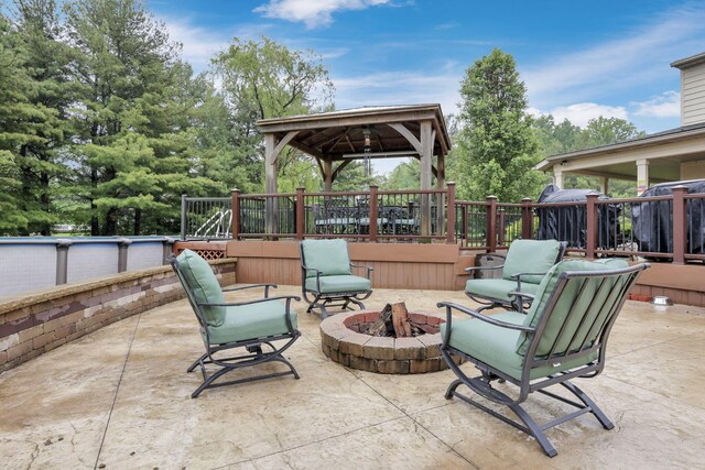 8270 Windy Hollow Rd, Johnstown, OH 43031 - view of patio featuring a gazebo and a fire pit