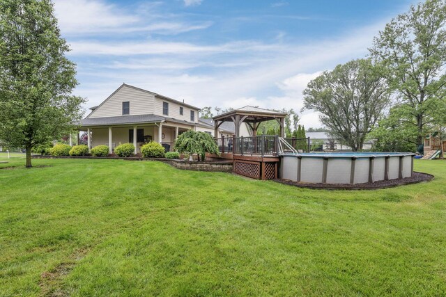 8270 Windy Hollow Rd, Johnstown, OH 43031 - view of grassy yard featuring a gazebo, an outdoor pool, and a playground