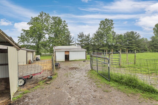 8270 Windy Hollow Rd, Johnstown, OH 43031 - view of yard featuring an outdoor structure, a pole building, and an exterior structure
