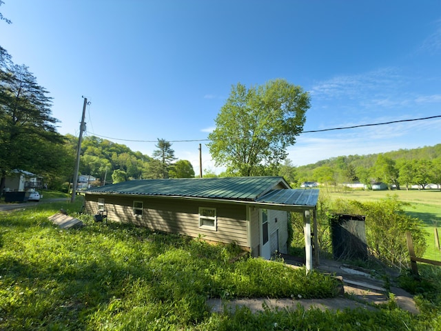 140 Sycamore St, Glouster, OH 45732 - back of house with metal roof