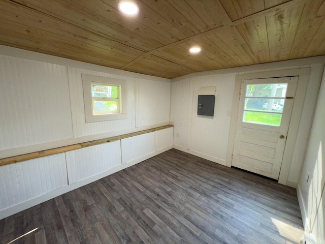 140 Sycamore St, Glouster, OH 45732 - empty room featuring wood ceiling, electric panel, dark wood-type flooring, plenty of natural light, and baseboards