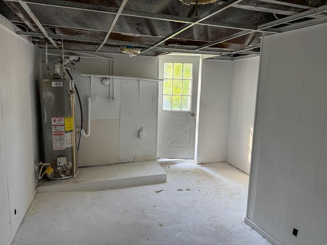 140 Sycamore St, Glouster, OH 45732 - basement with gas water heater and wood walls