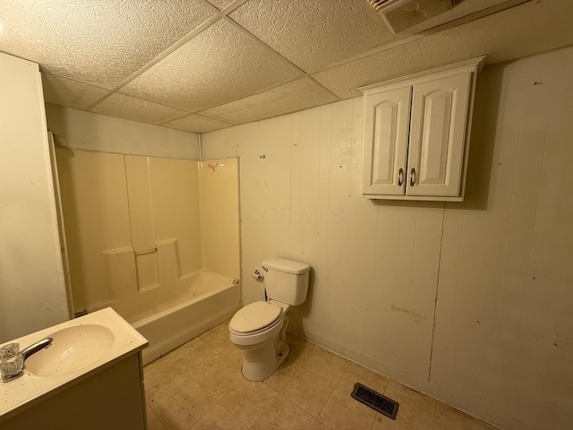 140 Sycamore St, Glouster, OH 45732 - full bath with toilet, vanity, a drop ceiling, and bathtub / shower combination