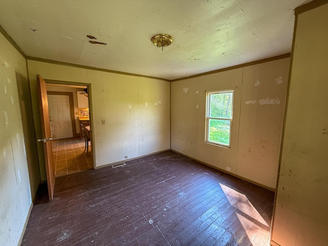 140 Sycamore St, Glouster, OH 45732 - unfurnished room with ornamental molding, baseboards, and wood finished floors