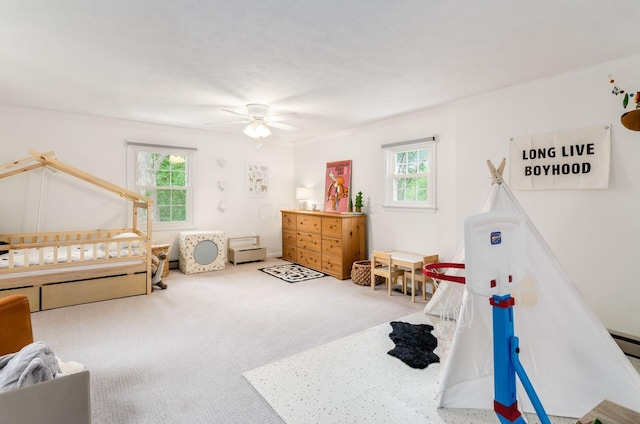 232 N Stanwood Rd, Columbus, OH 43209 - bedroom featuring multiple windows, crown molding, carpet, baseboard heating, and ceiling fan
