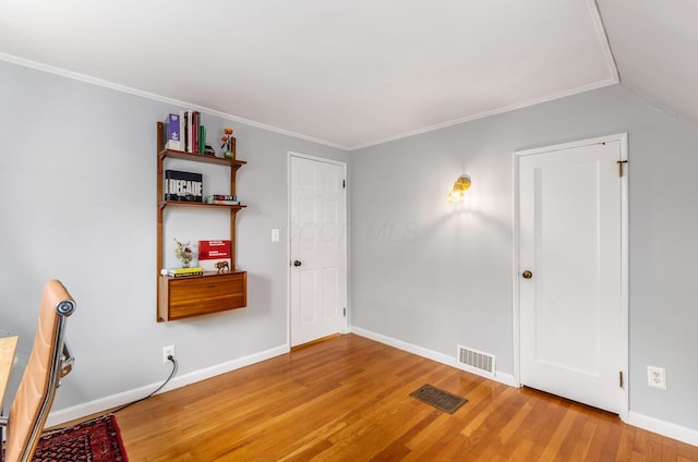 232 N Stanwood Rd, Columbus, OH 43209 - unfurnished bedroom featuring light wood-type flooring, baseboards, and crown molding