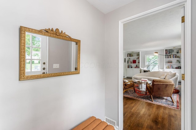 232 N Stanwood Rd, Columbus, OH 43209 - hallway featuring wood finished floors and built in shelves