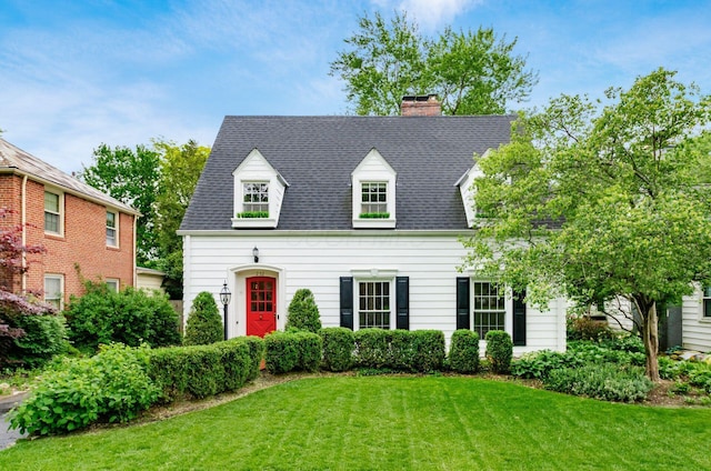 232 N Stanwood Rd, Columbus, OH 43209 - cape cod home with a front lawn, a chimney, and a shingled roof