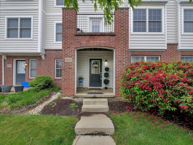 6010 Turnwood Dr Unit 703, Westerville, OH 43081 - doorway to property featuring brick siding