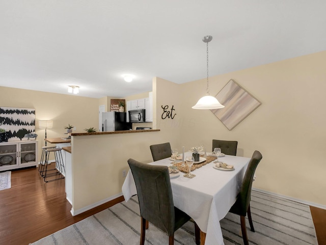 6010 Turnwood Dr Unit 703, Westerville, OH 43081 - dining room with wood finished floors and baseboards