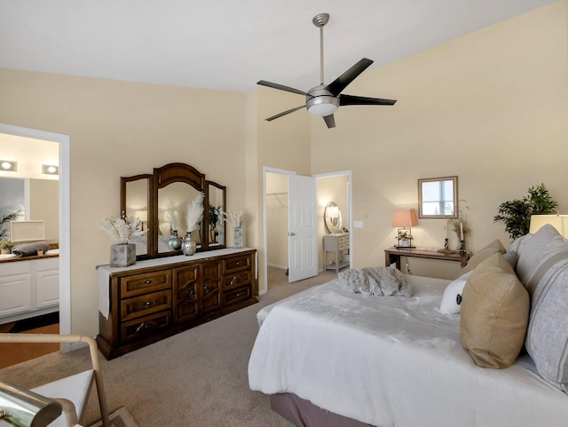 6010 Turnwood Dr Unit 703, Westerville, OH 43081 - bedroom with carpet flooring, a spacious closet, high vaulted ceiling, ensuite bathroom, and a ceiling fan
