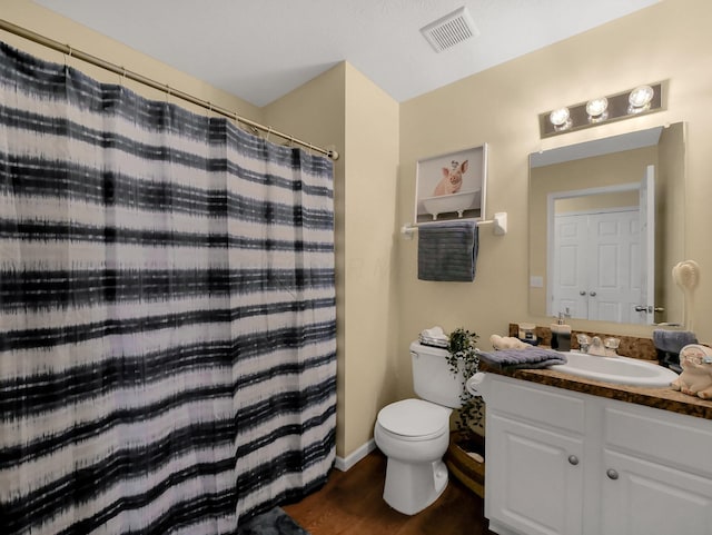6010 Turnwood Dr Unit 703, Westerville, OH 43081 - bathroom with toilet, vanity, and wood finished floors
