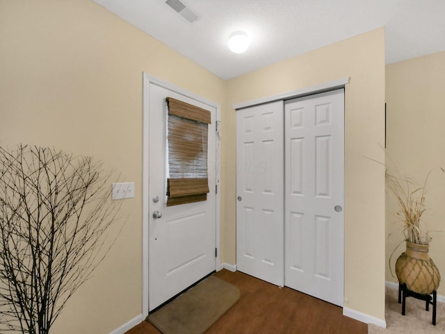6010 Turnwood Dr Unit 703, Westerville, OH 43081 - entryway featuring dark wood-style floors and baseboards