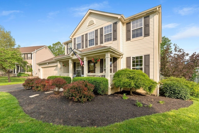 369 Highbanks Valley Ct, Newark, OH 43055 - view of front facade featuring covered porch and an attached garage