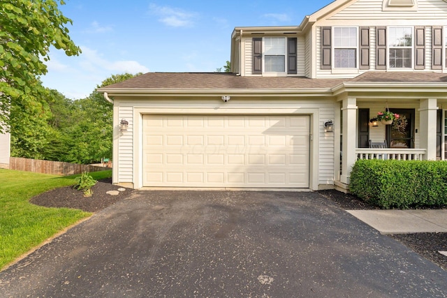 369 Highbanks Valley Ct, Newark, OH 43055 - view of front of home with asphalt driveway and a porch