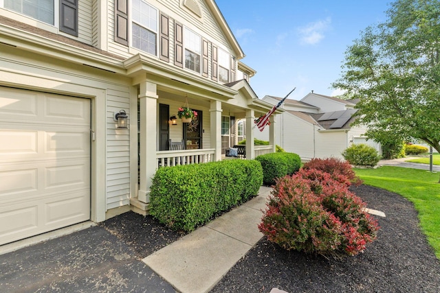 369 Highbanks Valley Ct, Newark, OH 43055 - view of exterior entry featuring a porch