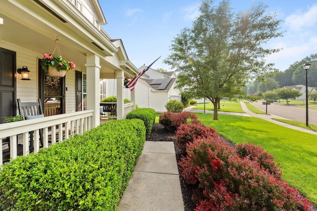 369 Highbanks Valley Ct, Newark, OH 43055 - view of side of property featuring covered porch and a yard