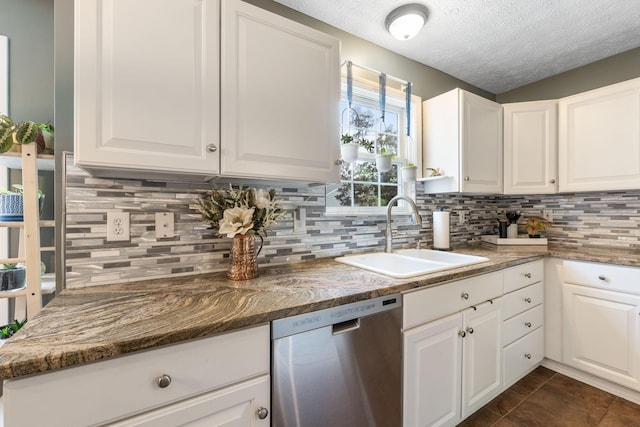 369 Highbanks Valley Ct, Newark, OH 43055 - kitchen with dishwasher, white cabinetry, tasteful backsplash, dark stone counters, and a textured ceiling