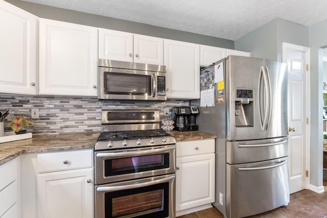 369 Highbanks Valley Ct, Newark, OH 43055 - kitchen with stainless steel appliances, decorative backsplash, white cabinets, and stone counters
