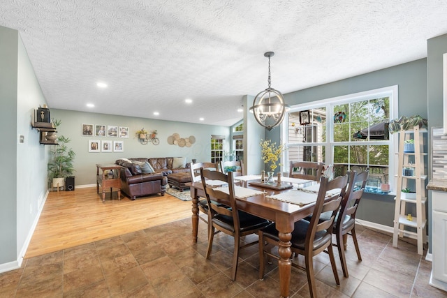 369 Highbanks Valley Ct, Newark, OH 43055 - dining room featuring a chandelier, recessed lighting, a textured ceiling, and wood finished floors
