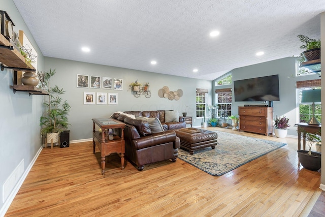 369 Highbanks Valley Ct, Newark, OH 43055 - living area with light wood-type flooring, a textured ceiling, and recessed lighting