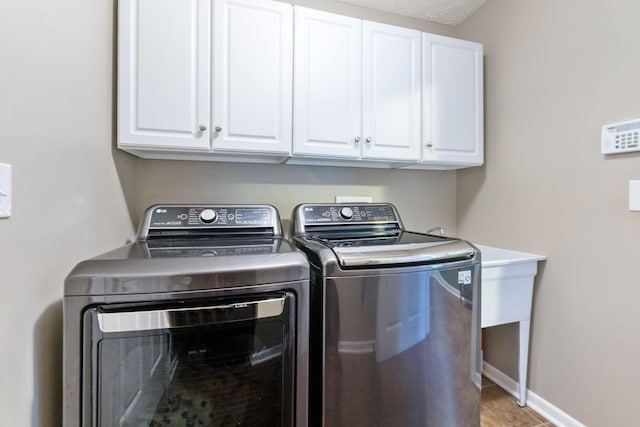 369 Highbanks Valley Ct, Newark, OH 43055 - laundry room featuring washer and clothes dryer and cabinet space