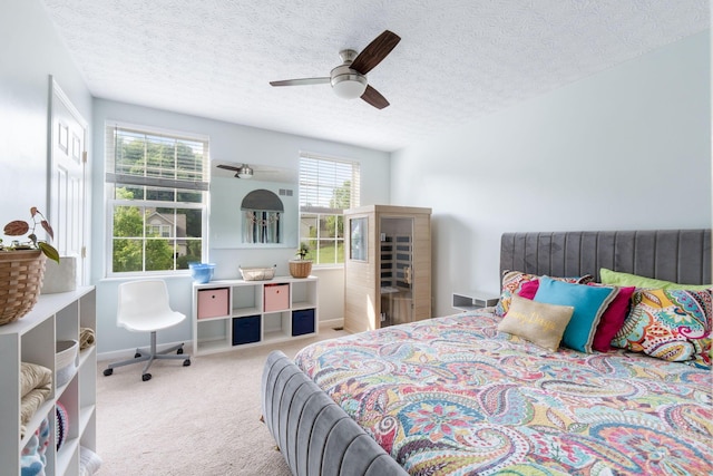 369 Highbanks Valley Ct, Newark, OH 43055 - bedroom featuring carpet floors, a textured ceiling, and ceiling fan