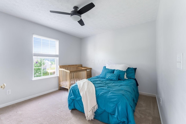 369 Highbanks Valley Ct, Newark, OH 43055 - carpeted bedroom featuring a textured ceiling and ceiling fan