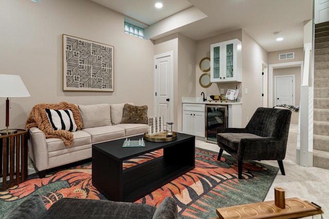 2587 Dayton Ave, Columbus, OH 43202 - living area with wine cooler, carpet floors, bar area, and recessed lighting