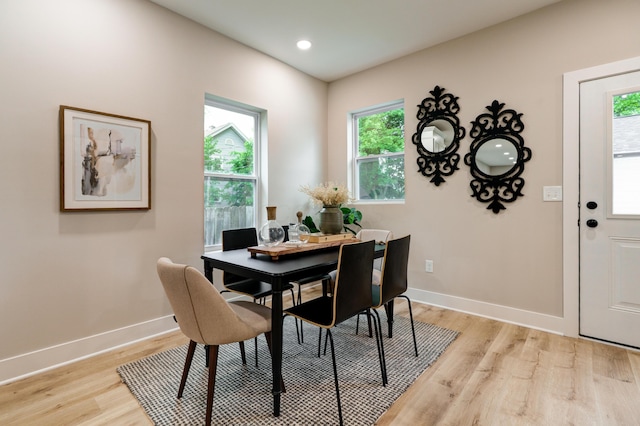 2587 Dayton Ave, Columbus, OH 43202 - dining space with light wood-style floors, baseboards, and recessed lighting