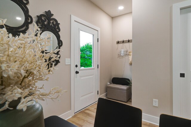 2587 Dayton Ave, Columbus, OH 43202 - doorway to outside with light wood-style floors, baseboards, and recessed lighting