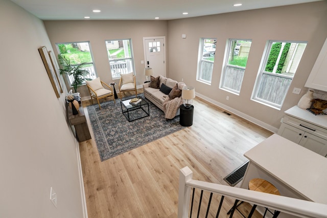 2587 Dayton Ave, Columbus, OH 43202 - living area featuring recessed lighting, light wood finished floors, and baseboards