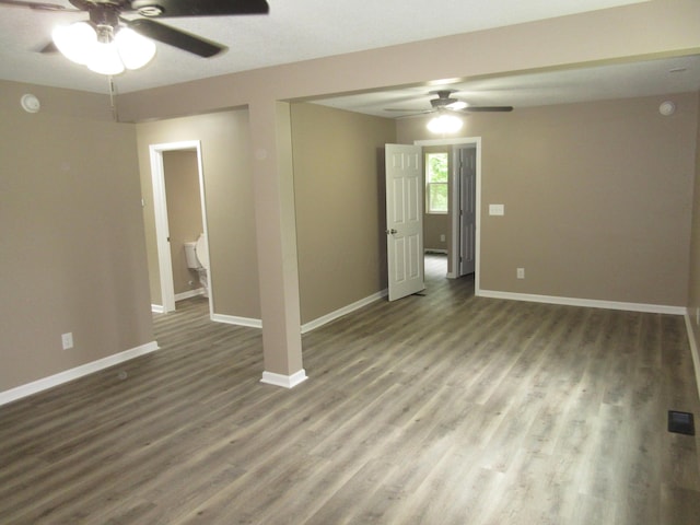 3814 London Hollow Rd NE, Newark, OH 43055 - empty room featuring ceiling fan, wood finished floors, baseboards, and a smoke detector