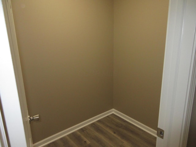 3814 London Hollow Rd NE, Newark, OH 43055 - spare room with dark wood-style floors and baseboards