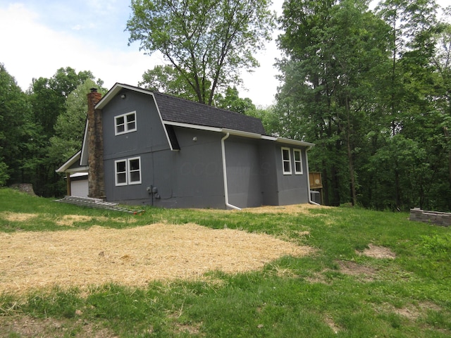 3814 London Hollow Rd NE, Newark, OH 43055 - rear view of property with a chimney, roof with shingles, and a lawn