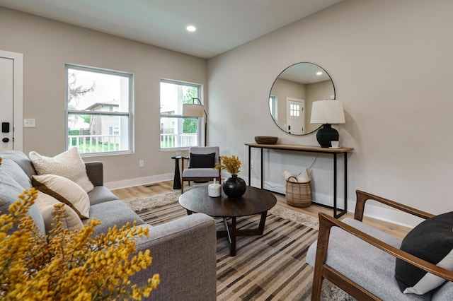 2589 Dayton Ave, Columbus, OH 43202 - living area with wood finished floors, baseboards, and recessed lighting