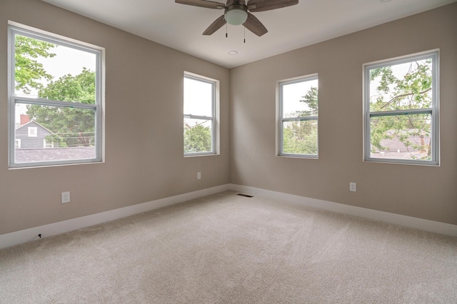 2589 Dayton Ave, Columbus, OH 43202 - unfurnished room featuring ceiling fan, carpet flooring, and baseboards