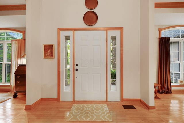364 Morgan Ln, Columbus, OH 43230 - foyer entrance with light wood-style floors and baseboards
